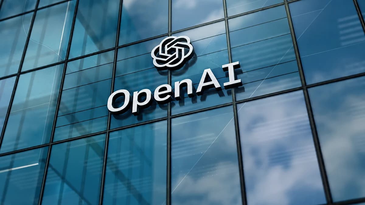 OpenAI logo on a glass building facade